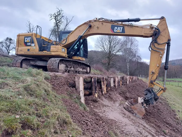Erdarbeiten aushub cat 320